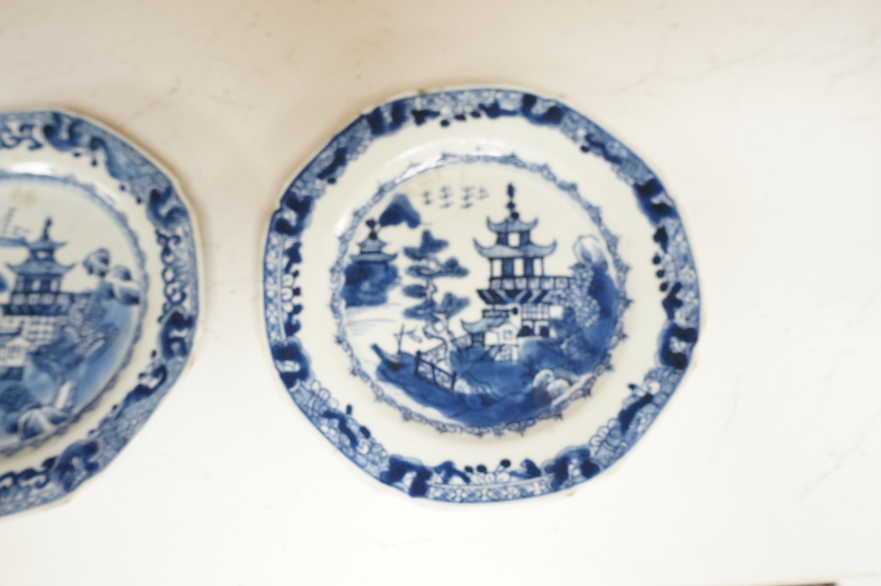 Three 18th century Chinese blue and white Export side plates, 19cm diameter